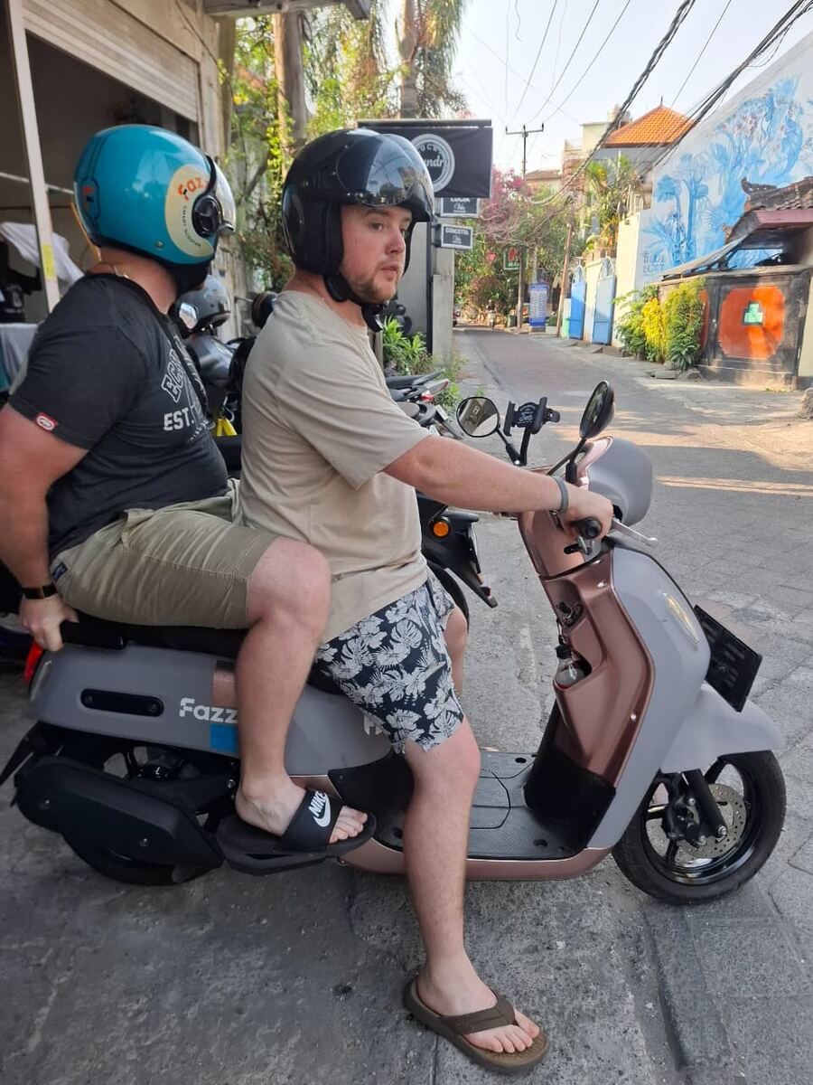 Customers riding a Yamaha Fazzio in Seminyak