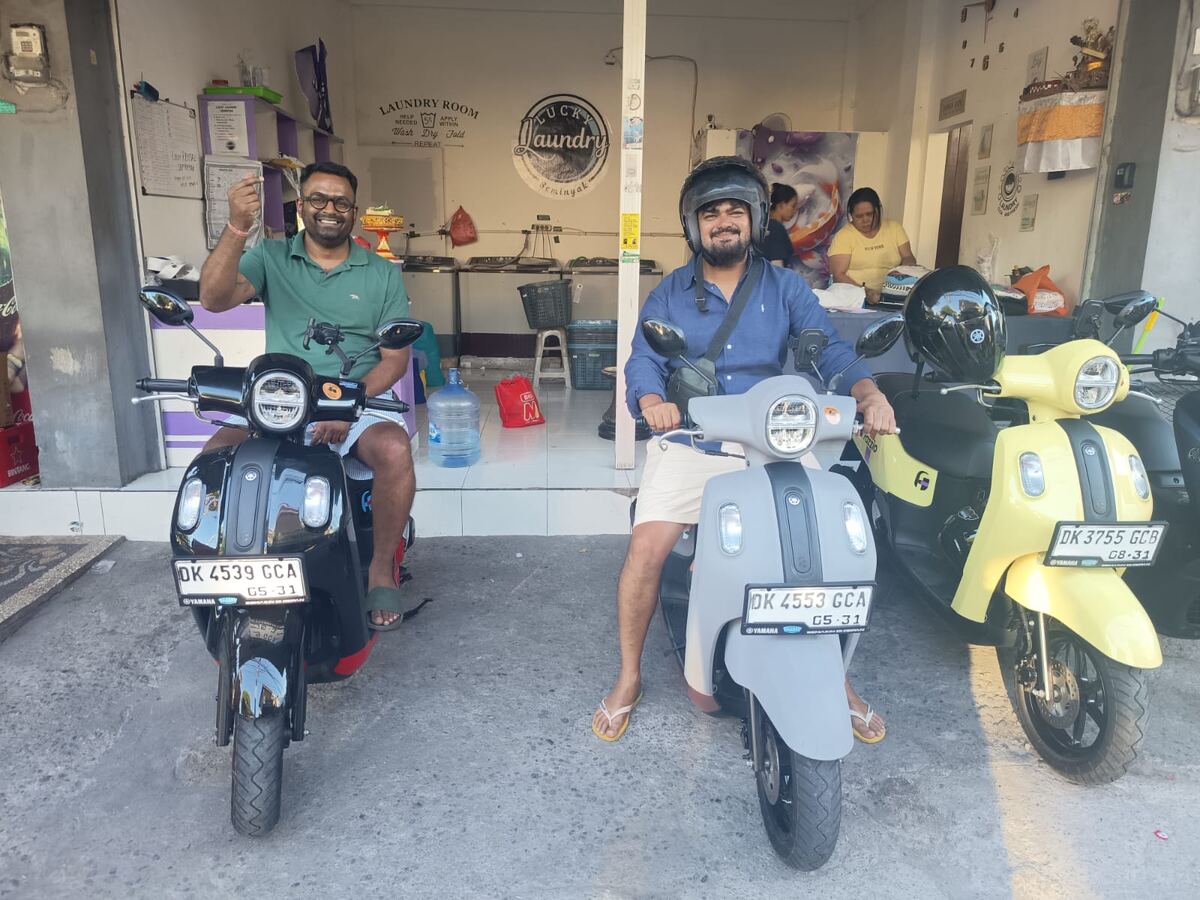 Customers on Yamaha Fazzio motorbikes at the shop
